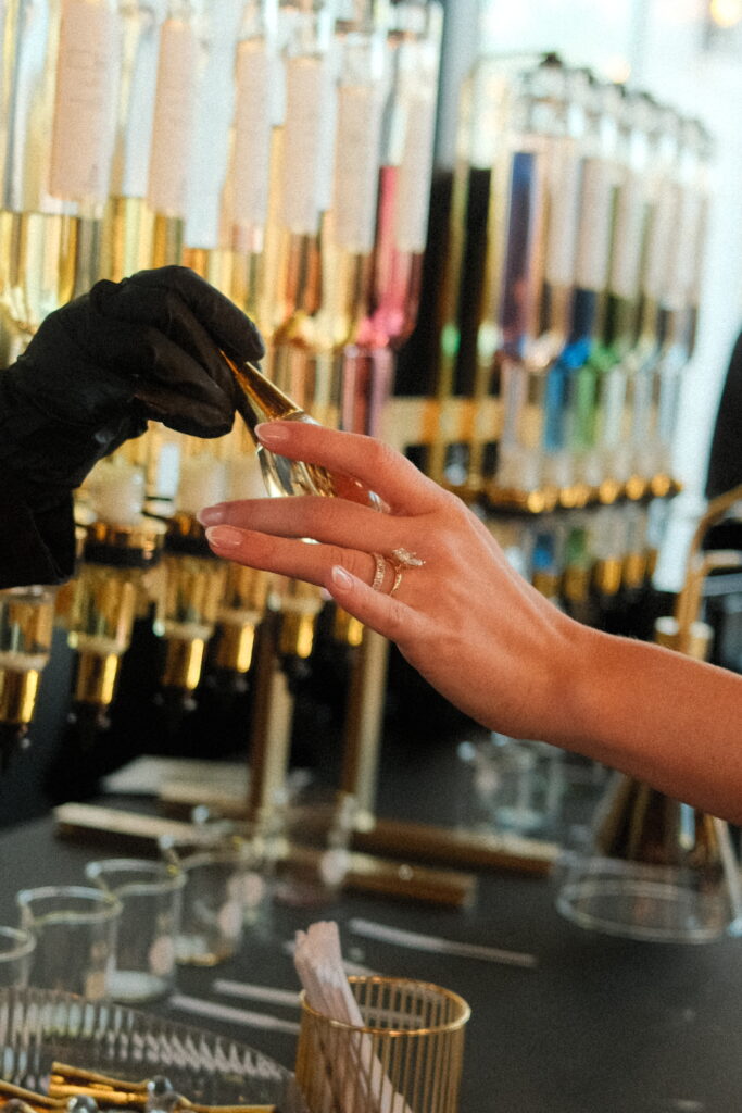 Guests blending signature scents at a Dallas perfume bar event